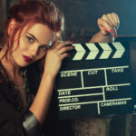 A girl with clapperboard