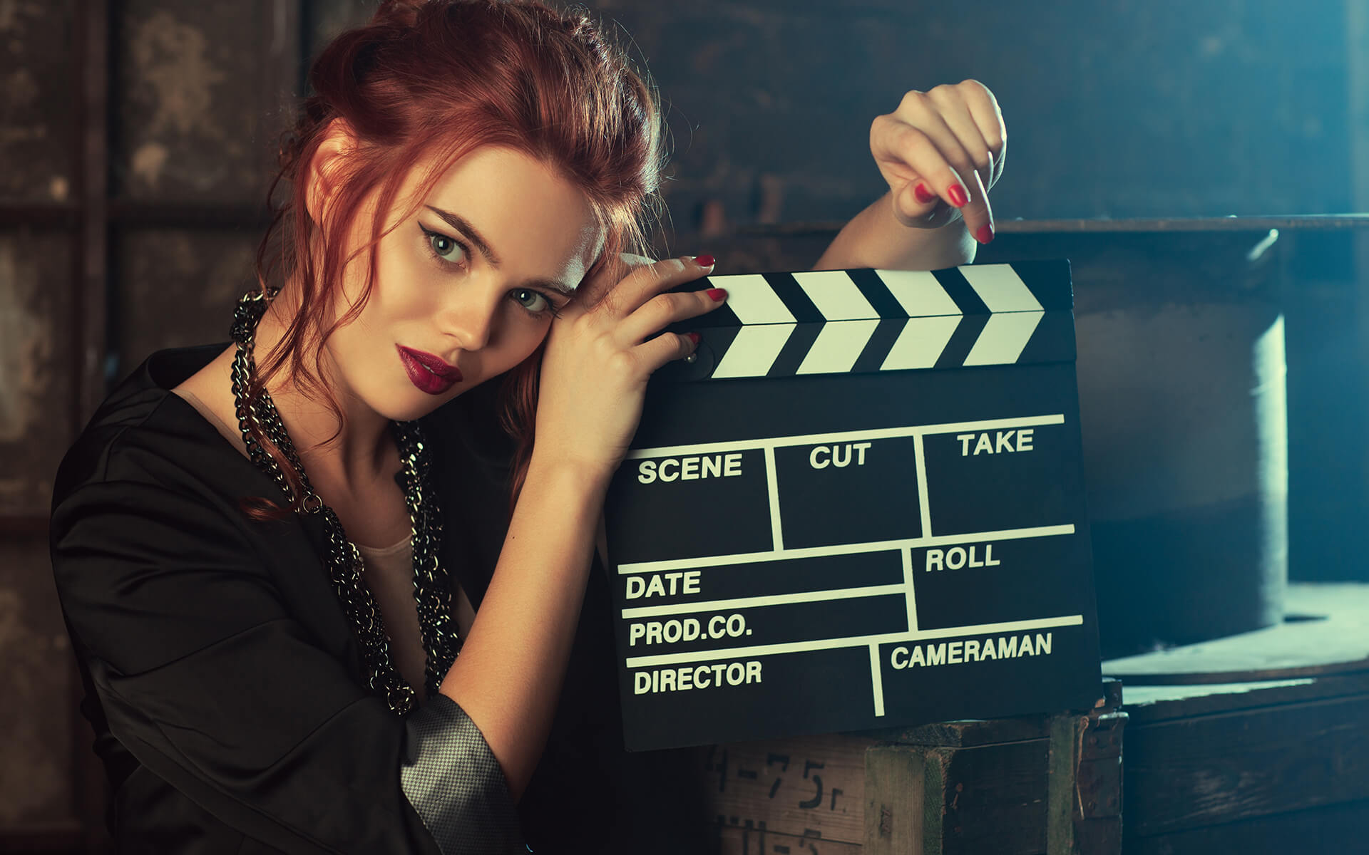 A girl with clapperboard